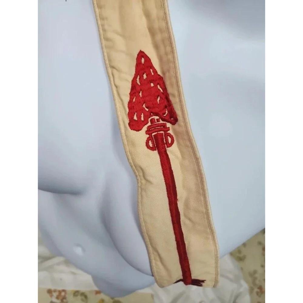 Boy scouts arriw sash 54 inches long